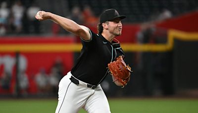 Diamondbacks take lead on back-to-back wild pitches, rally for 5-4 win over Rockies