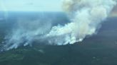 Production curtailed as wildfire burns out of control near Suncor's Firebag oilsands site | CBC News