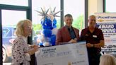 Henrietta's Four Stars Auto Ranch celebrates big win with nonprofit donation