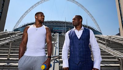 Joshua 'threatens Dubois with CHAIR' as the pair nearly come to blows