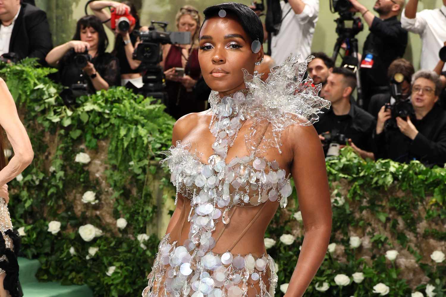 Janelle Monáe Floats into the 2024 Met Gala in Nothing but Holographic Sequins and Towering Heels