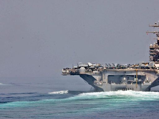 A US Navy carrier strike group equipped with F-35 stealth fighters is rushing to the Middle East along with a submarine packed with Tomahawk missiles