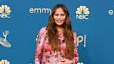 Chrissy Teigen Jokes She’s Been ‘Pregnant Forever,’ Shows Off Bare Baby Bump in a Swimsuit