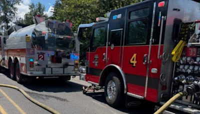 Man arrested after allegedly riding on the back of a Eugene fire truck