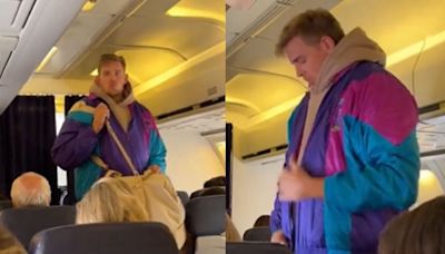 Video: Flight Passenger 'Removes' His Clothes One After Another, Drops Them In Overhead Bin