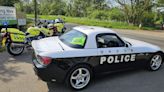 Motorcycle patrol pulls over Japanese 'police' car