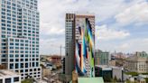Argentinian artist gives Journal Square a splash of color (PHOTOS)