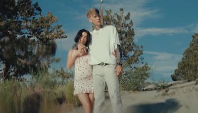 Megan Fox poses with a baby bump and baby in Machine Gun Kelly video