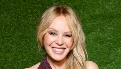 Kylie Minogue stuns in sequin gown before performing at charity event