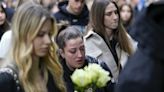 Serbia mourns 8 schoolchildren killed in shooting, with unprecedented unity