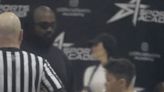 Kim Kardashian & Kanye West hug and laugh in rare reunion at basketball game