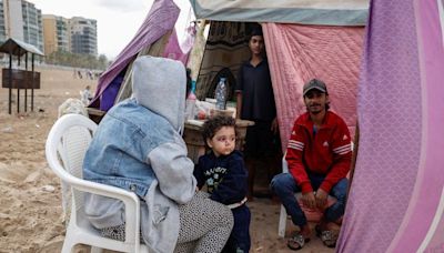 As Israeli jets hit Beirut, people flee to sleep on the beach