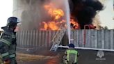 Fire at drone-hit Russian oil depot rages for second day, emergency services say