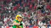 Oregon scores 45 unanswered points in rout over Liberty in 53rd Fiesta Bowl