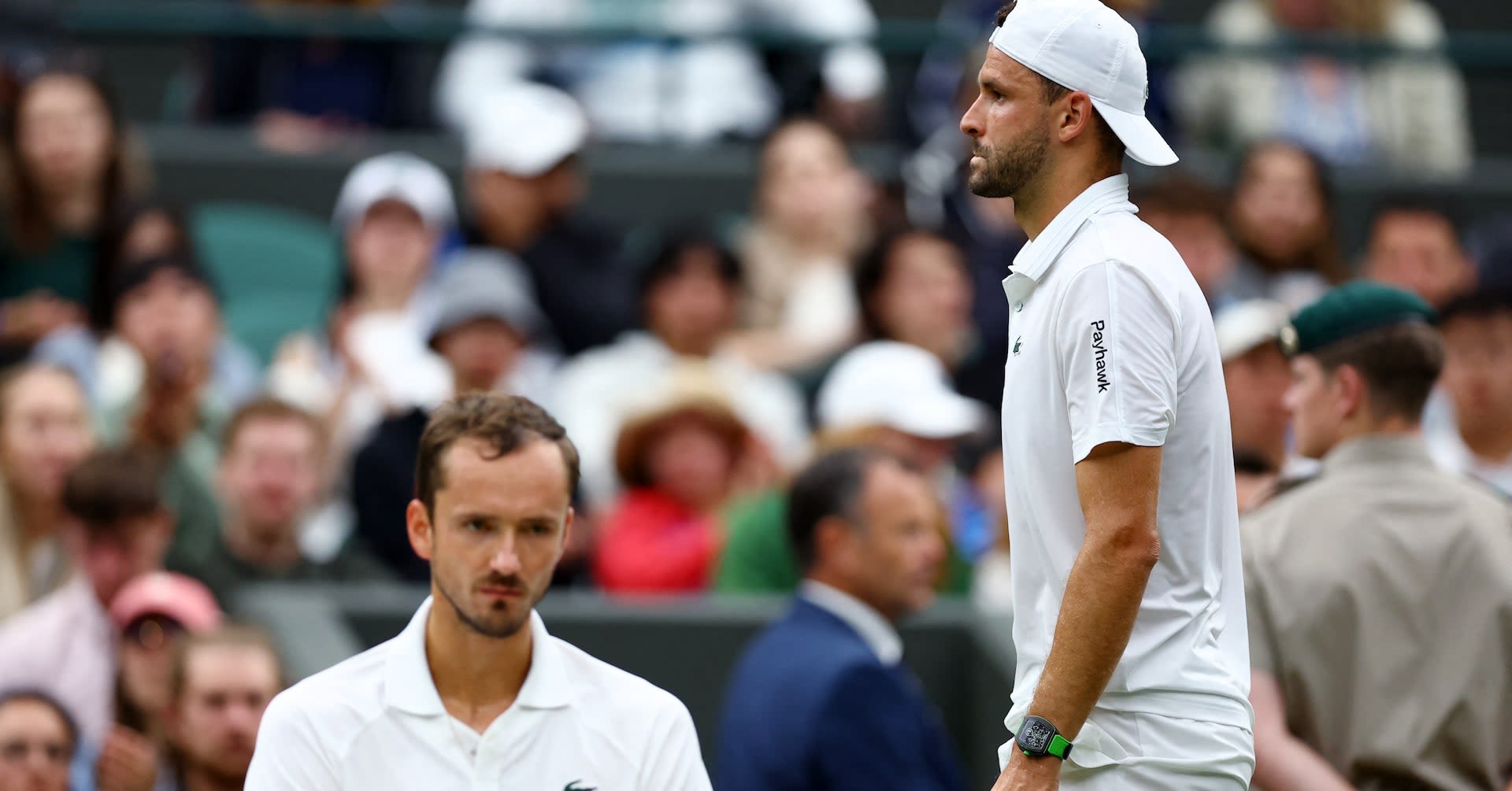 Dimitrov injury sends Medvedev through to Wimbledon quarter-finals