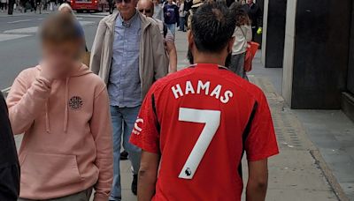 Police hunt for Man Utd fan with ‘Hamas 7’ printed on his shirt