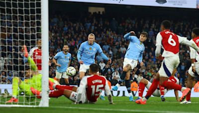 Stones scores deep in injury time as Man City salvage 2-2 draw with Arsenal