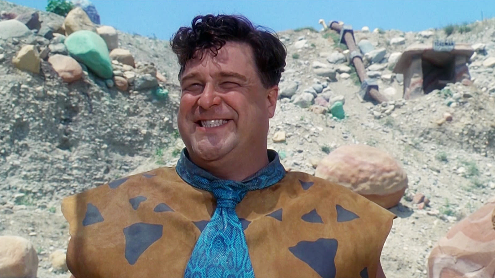 John Goodman Begged Steven Spielberg To Spare Him From Flintstones Movie Sequels - SlashFilm