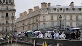 Paris barricades start to come down after opening ceremony on the Seine, but many still struggling