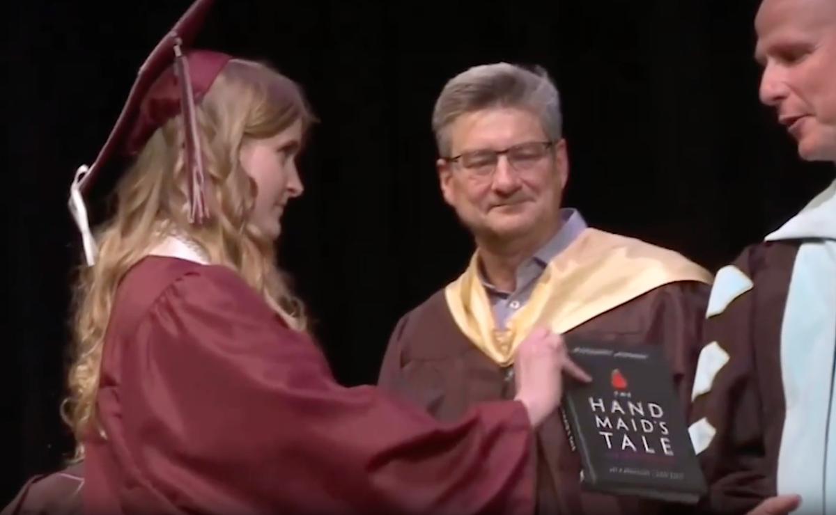 Watch: High school student’s defiant protest of book ban during graduation ceremony