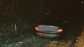 Railway line closed and trains cancelled after car abandoned on train tracks