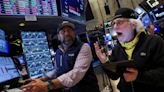 The Dow drops 600 points even as Nvidia powers the Nasdaq to a record high