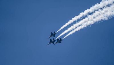 Blue Angels thrill Annapolis with stunts as protestors object to environmental costs