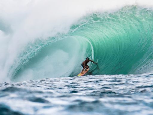 Former pro surfer known for riding huge Pipeline waves dies in shark attack while surfing off Oahu