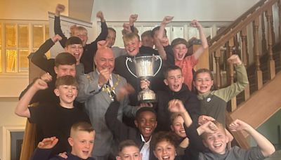 Football team meet the mayor after winning cup game for the first time in 40 years