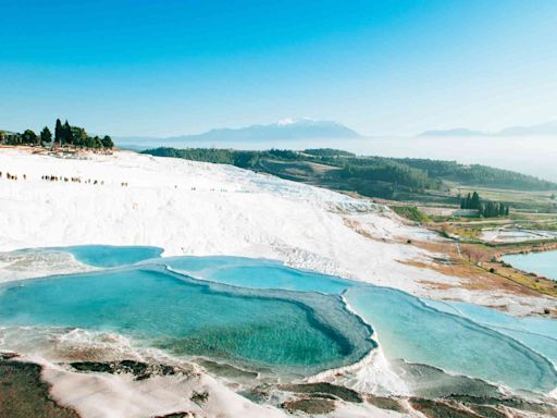 This Destination Was Just Named the Most 'Otherworldly' Magical Place on the Planet for Its Bright Blue Thermal Hot Springs