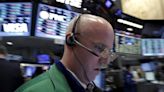 Stock market today: Dow ends flat as Microsoft fights back, financials gain