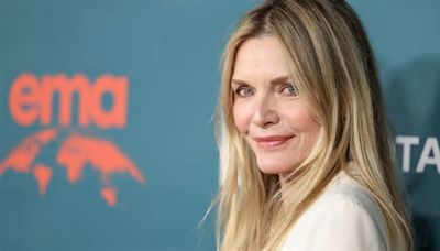 Michelle Pfeiffer uses this decor technique to create subtle boundaries in her open-concept living area