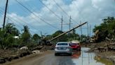 Puerto Rican municipal workers pitch in as power outages persist