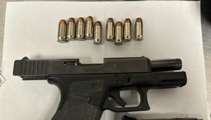 Loaded guns and a grenade found with airport passenger at SEA on Tuesday