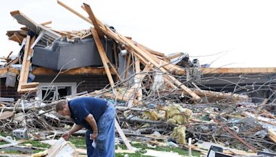 Residents begin going through the rubble after tornadoes hammer parts of Nebraska and Iowa