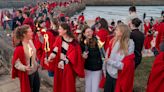 Inside May Day tradition as hundreds march in cult-like gowns before cold plunge