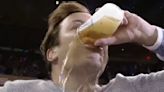 Jimmy Fallon demolishes hot dog, chugs beer at Lightning-Rangers game