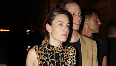 Camille Rowe and Nikolai Von Bismarck arrive together at Vogue party