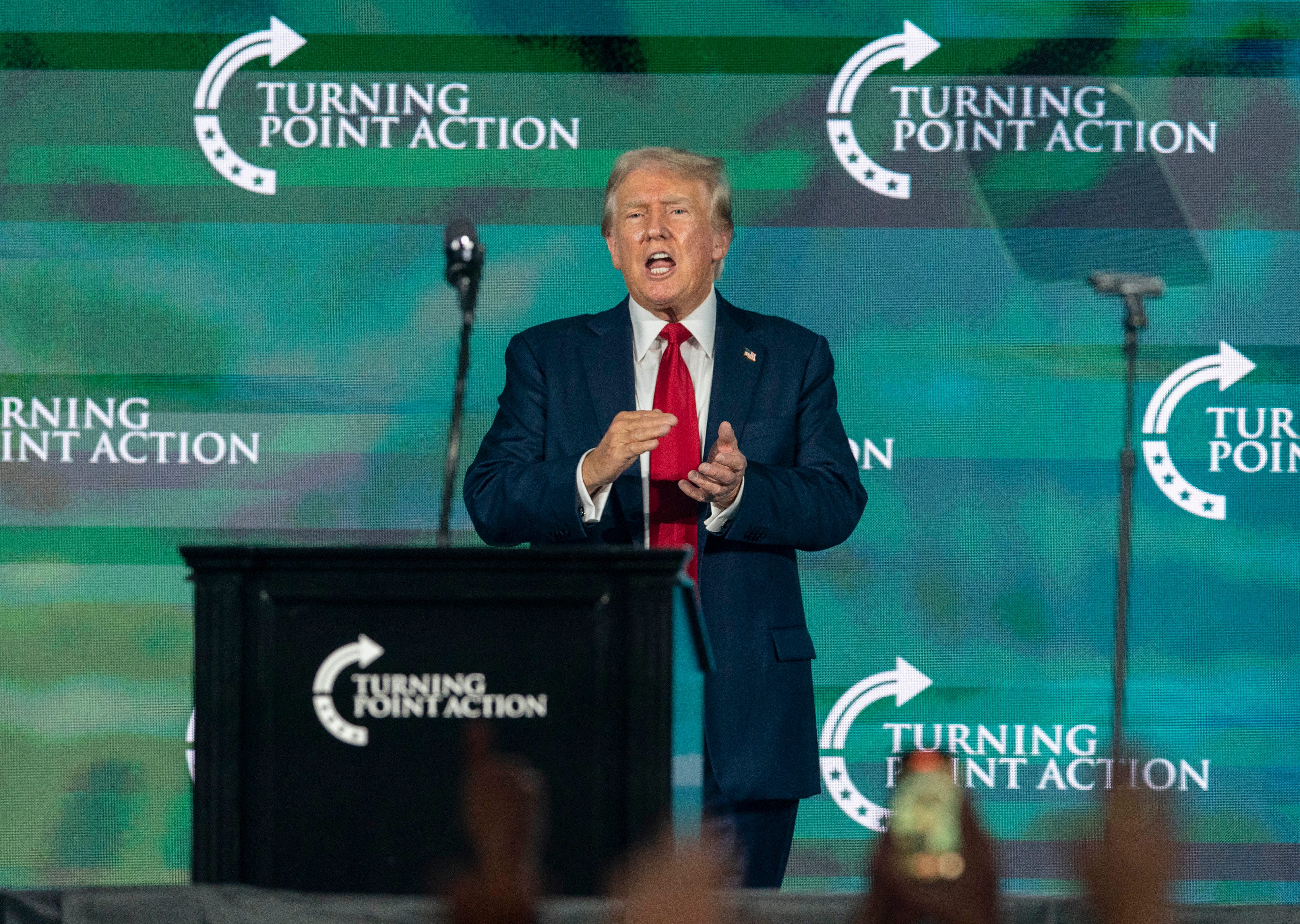 Donald Trump rallies supporters at the Turning Point Believers' Summit in West Palm Beach