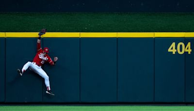 How Cincinnati Reds practice what they reach over outfield walls around MLB | Press Box Wag