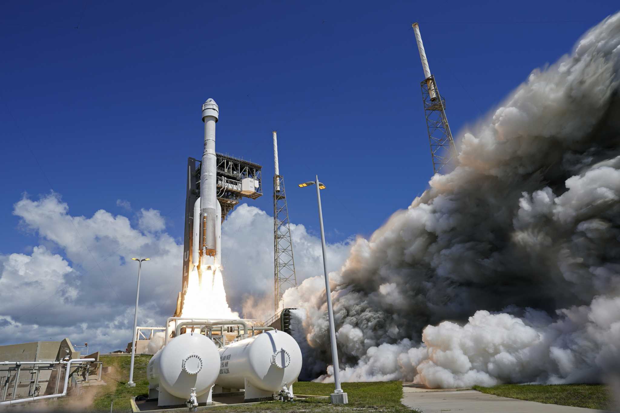 Boeing's space capsule springs more helium leaks on its first test flight with astronauts