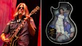 Tool’s Adam Jones Unveils Epiphone Les Paul Guitar Featuring Artwork by His Wife Korin Faught