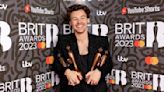 Harry Styles' mom slams critics of his shaved head in Instagram post