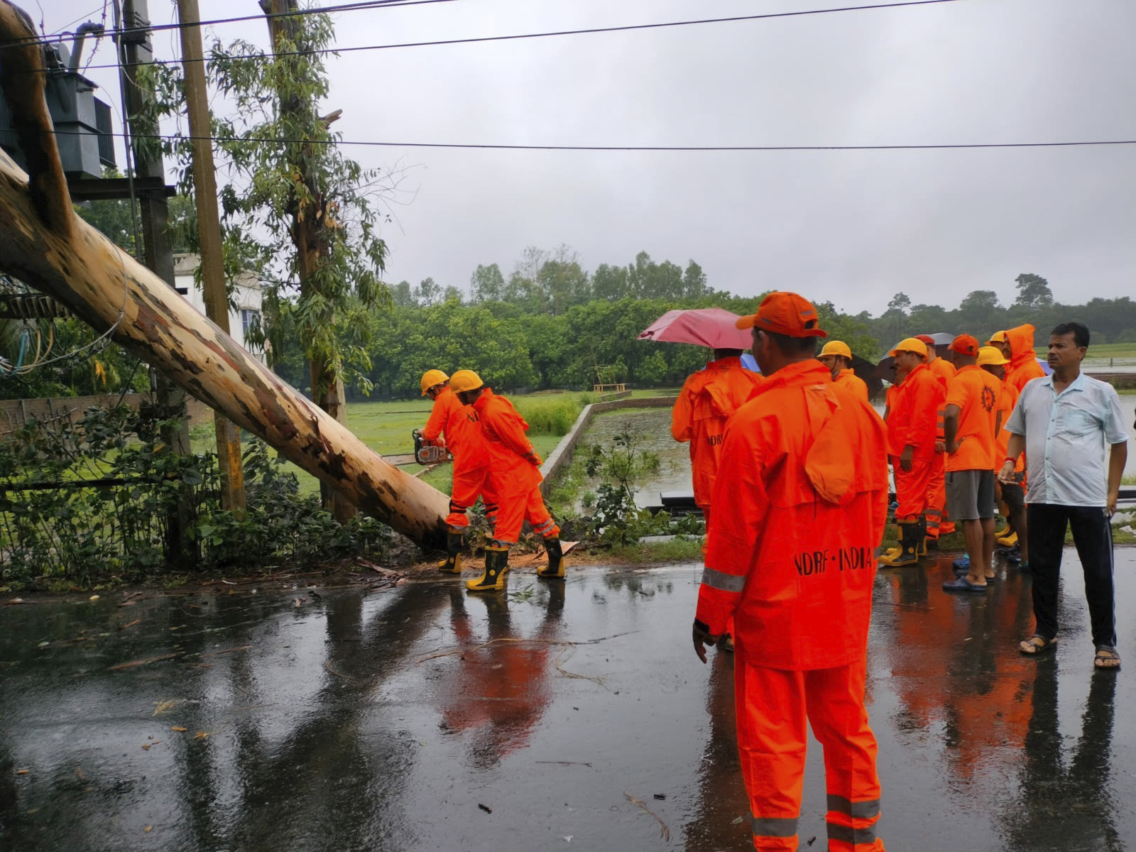 Cyclone floods coastal villages, blows away thatched roofs and cuts power in Bangladesh and India