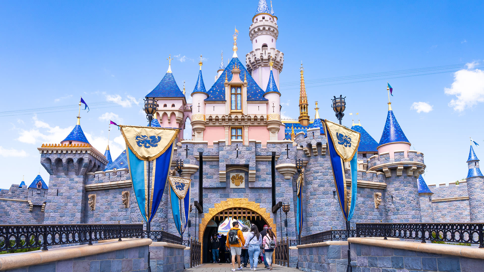 Adult Disney fanatics sue to get back into club after theme park kicks them out