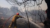Greece heatwave latest: Hunt for arsonist suspected of sparking Athens wildfire as search for missing American continues