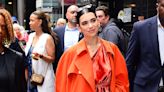 Dua Lipa Brings the Party to Fall in a Ruffled Orange Halter Top and Snakeskin Pants