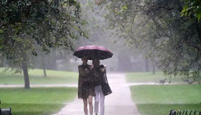 Met Office warns heavy rain will hit parts of UK but Wimbledon fans will bask in 21C sunshine