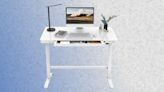 Save Over 50% Off This Flexispot Electric Standing Desk with Glass Top