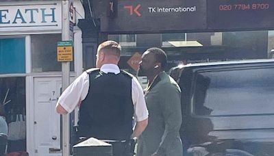 Derek Chisora speaks to police after he was filmed headbutting a rider